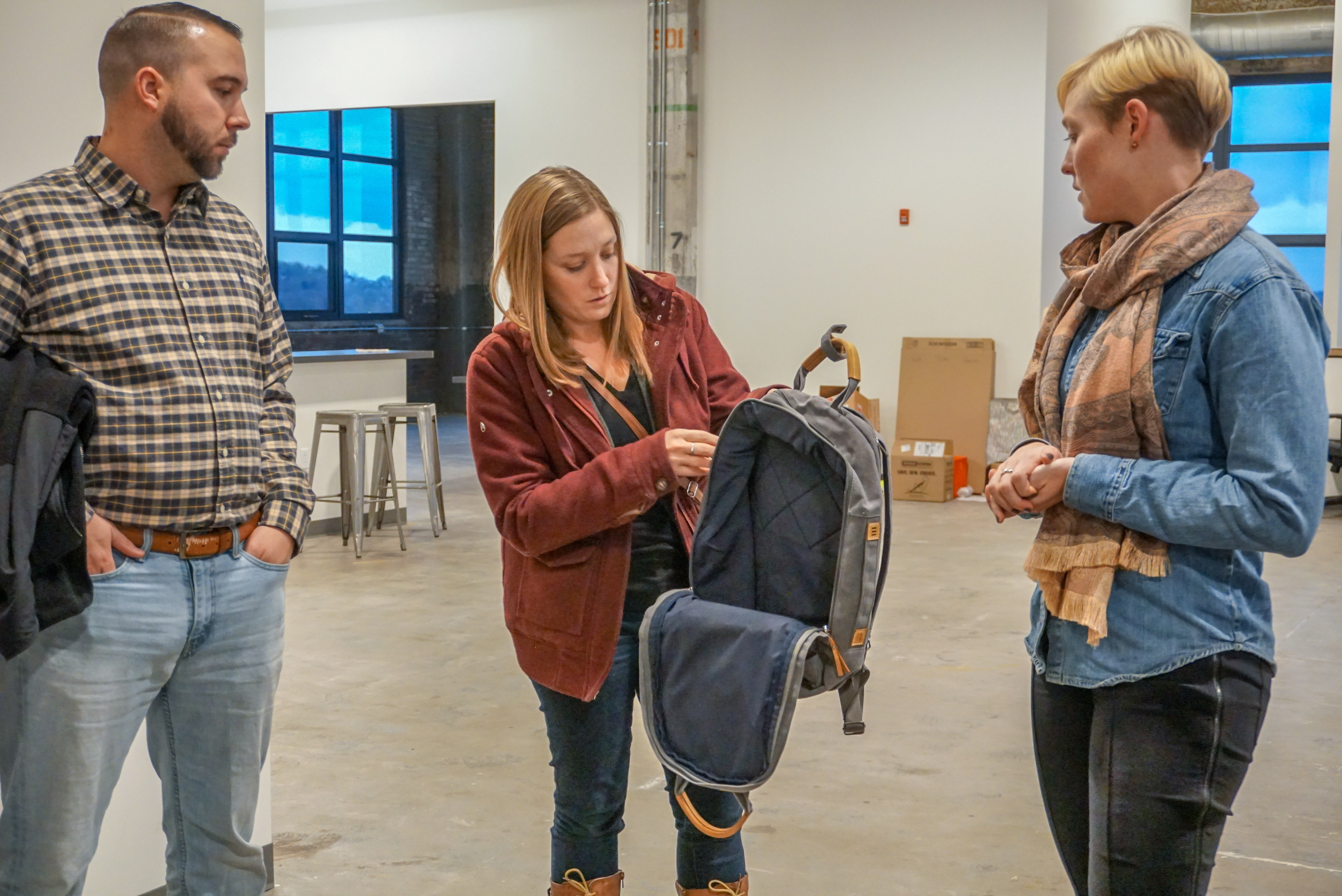 CEC Green Team member Kristen Robertson opens A Better Backpack