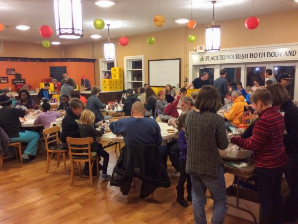 CEC Toledo employees volunteer at a lunch-packing event for Food for Thought