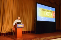 Quatchak speaks at CEC's annual internal conference in 2015.